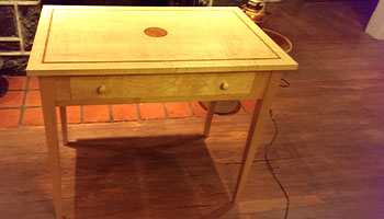 A maple writing desk made by Dr. Ike Eisenlohr